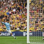 Manchester City's Spanish midfielder David Silva (C) scores the team's first goal during the English FA Cup final football match between Manchester City and Watford at Wembley Stadium in London, on May 18, 2019. (Photo by Daniel LEAL-OLIVAS / AFP) / NOT FOR MARKETING OR ADVERTISING USE / RESTRICTED TO EDITORIAL USE (Photo credit should read DANIEL LEAL-OLIVAS/AFP/Getty Images)