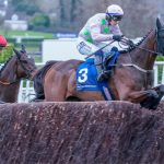 Gaelic Warrior jumping a fence in the Arkle Chase